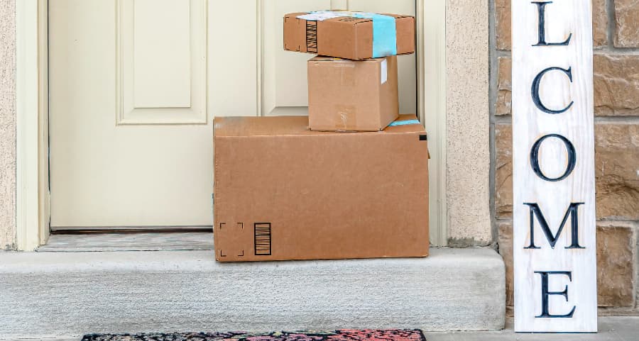 Deliveries on the front porch of a house with a welcome sign in San Francisco